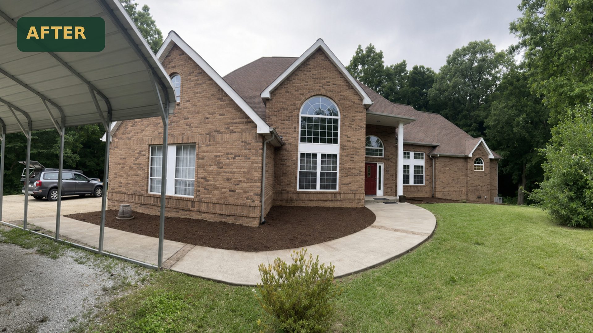 Wide after shot of a brick home in Chattanooga, TN with restored beds, fresh mulch, and clean curb appeal by LNK Ventures